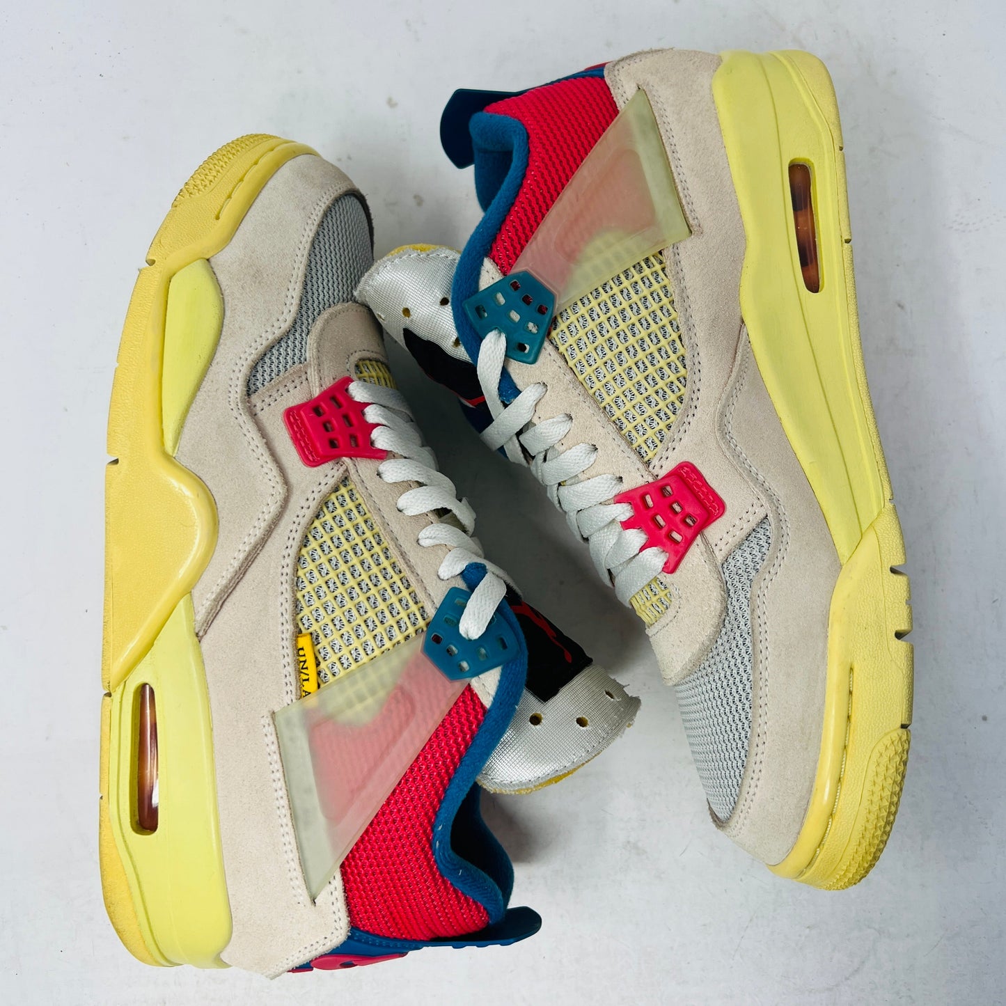 Jordan 4 Retro Union Guava Ice