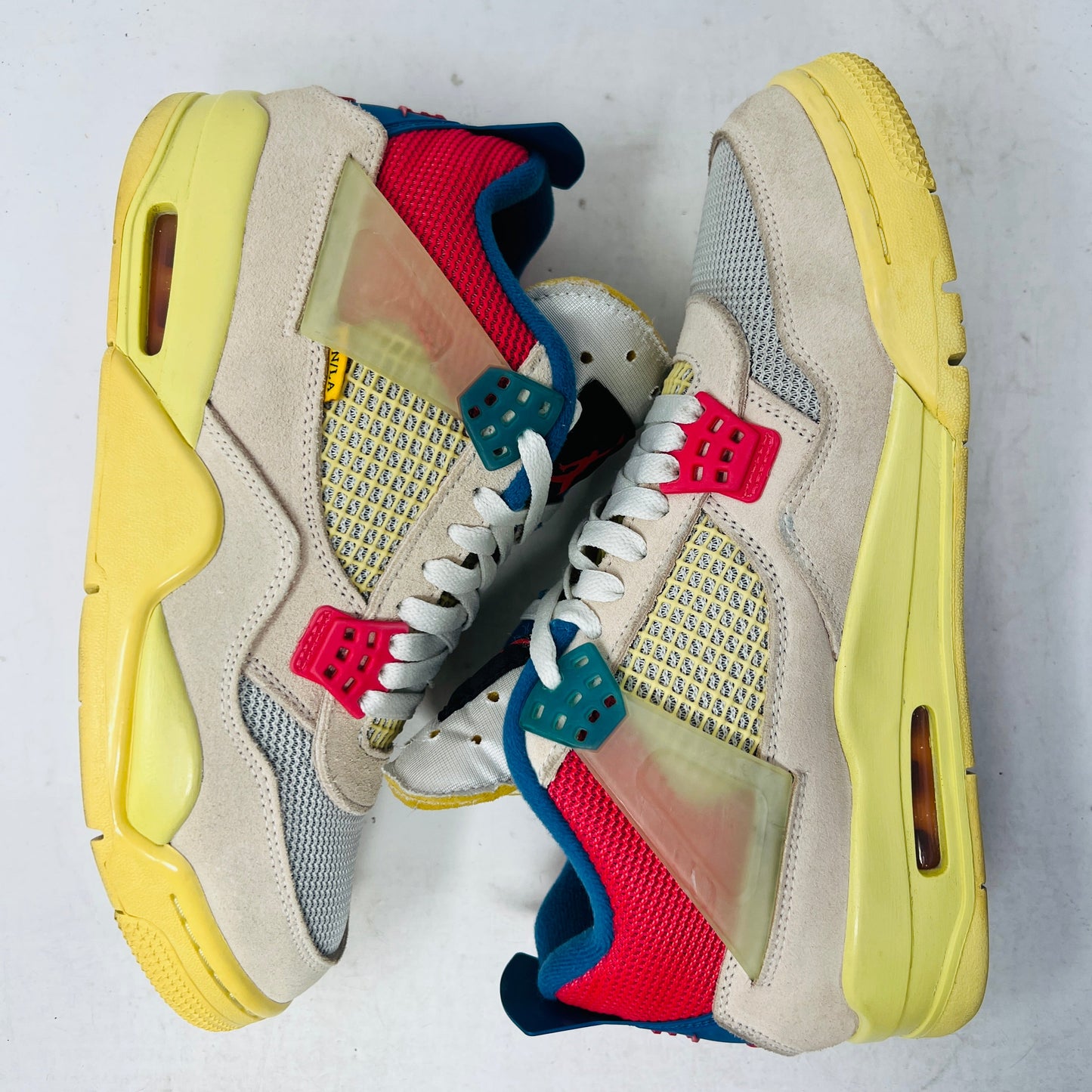 Jordan 4 Retro Union Guava Ice
